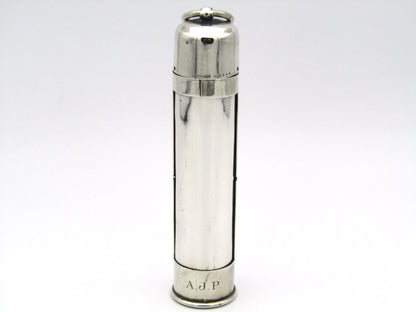 Sterling silver thermometer with swivelling case.