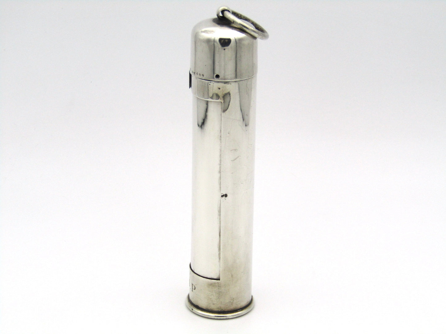 Sterling silver thermometer with swivelling case.