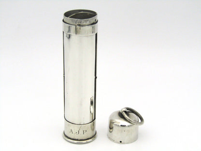 Sterling silver thermometer with swivelling case.