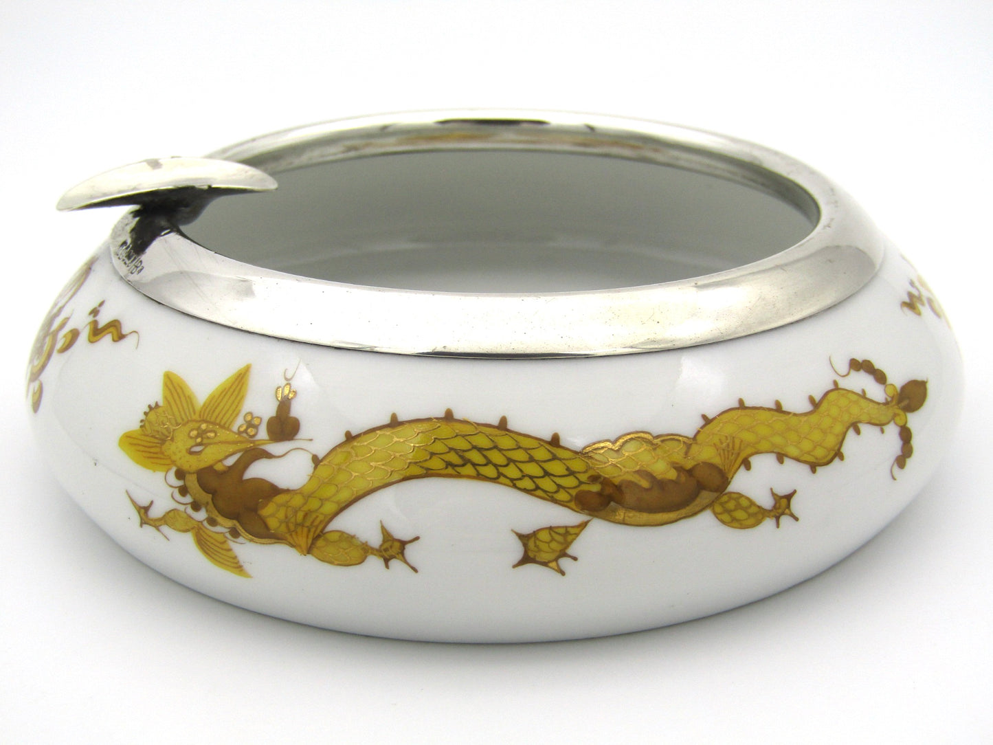 Meissen golden dragon ashtray with silver mount.