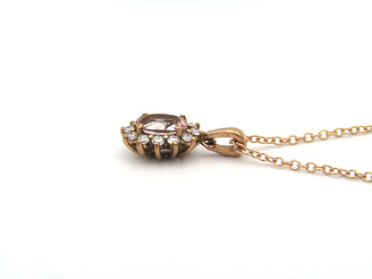 9K gold morganite and diamond pendant by Browns.