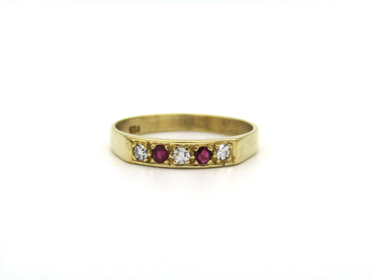 18K gold diamond and ruby ring.