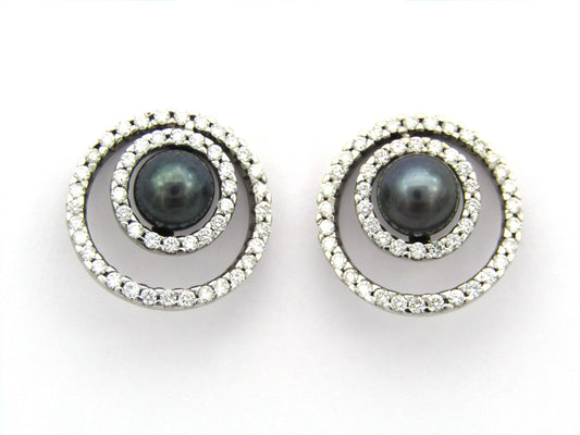 18K gold tahitian pearl and diamond earrings.