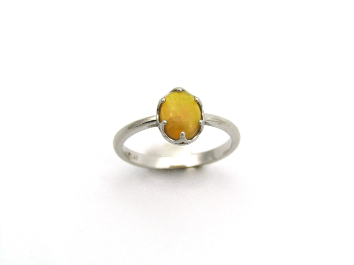 Platinum fire opal ring.