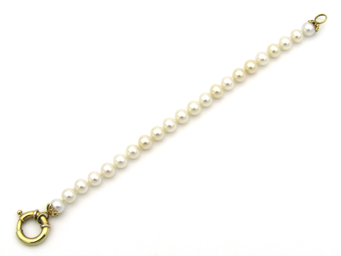 18K gold Protea pearl bracelet by Browns.