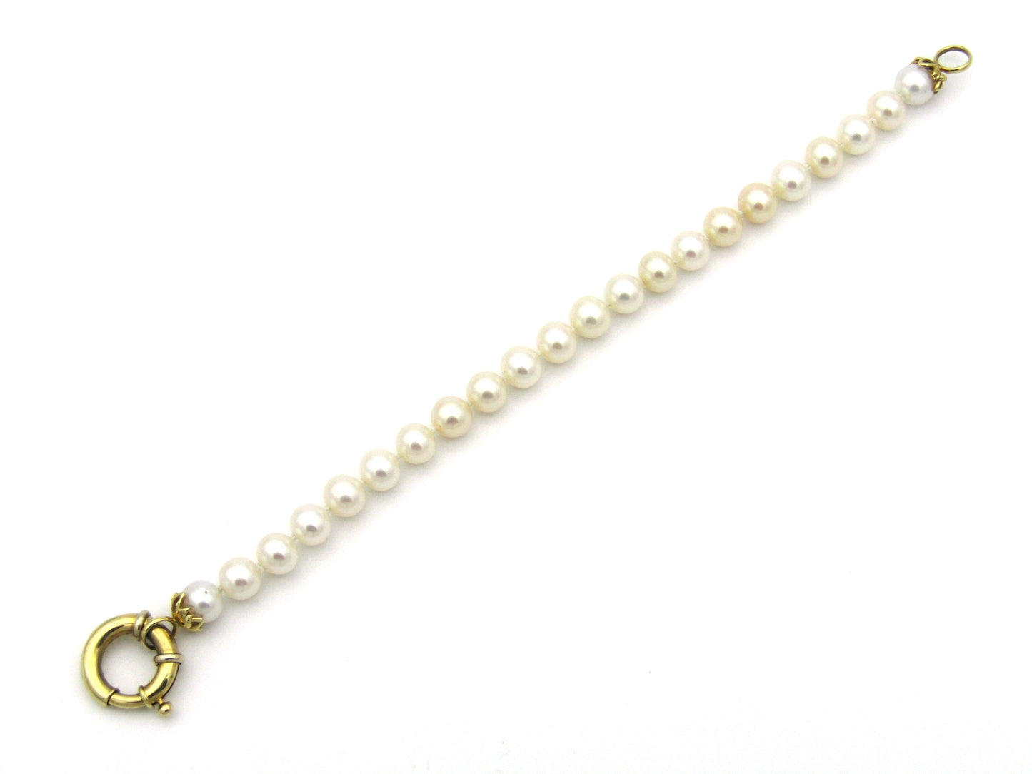 18K gold Protea pearl bracelet by Browns.