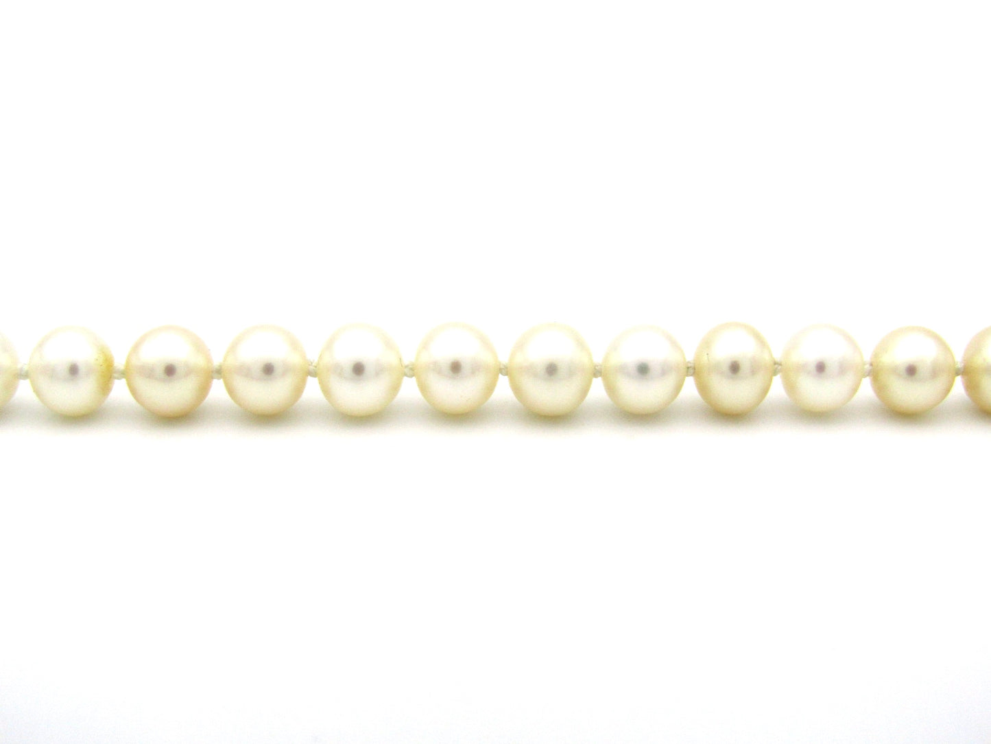 18K gold Protea pearl bracelet by Browns.