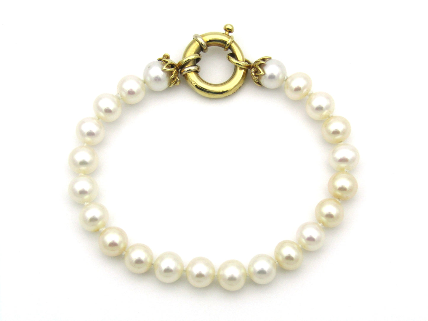 18K gold Protea pearl bracelet by Browns.