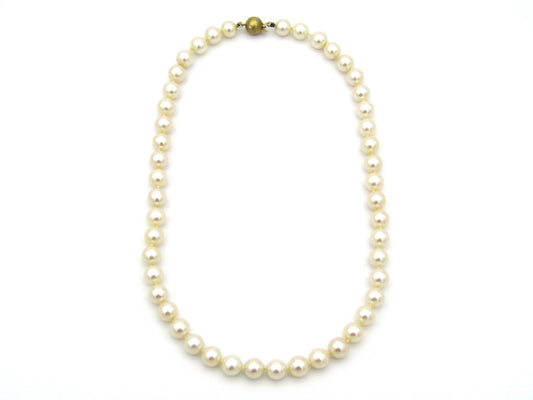 18K gold pearl and diamond necklace by Browns.