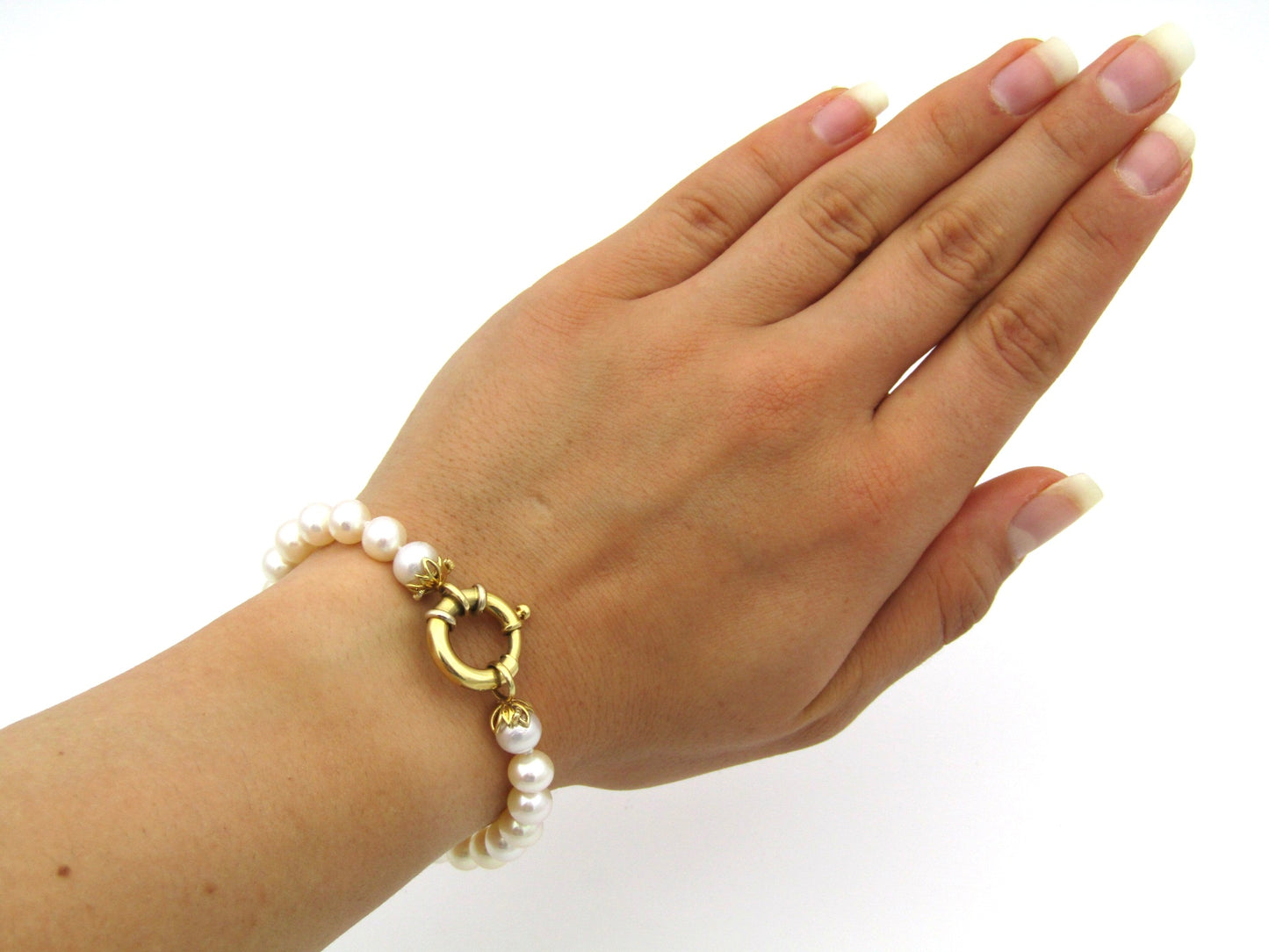 18K gold Protea pearl bracelet by Browns.