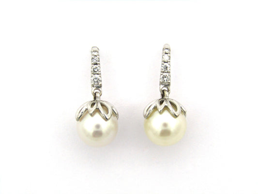 18K gold Protea pearl earrings by Browns.