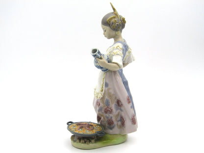 Lladro "Making Paella" figurine.