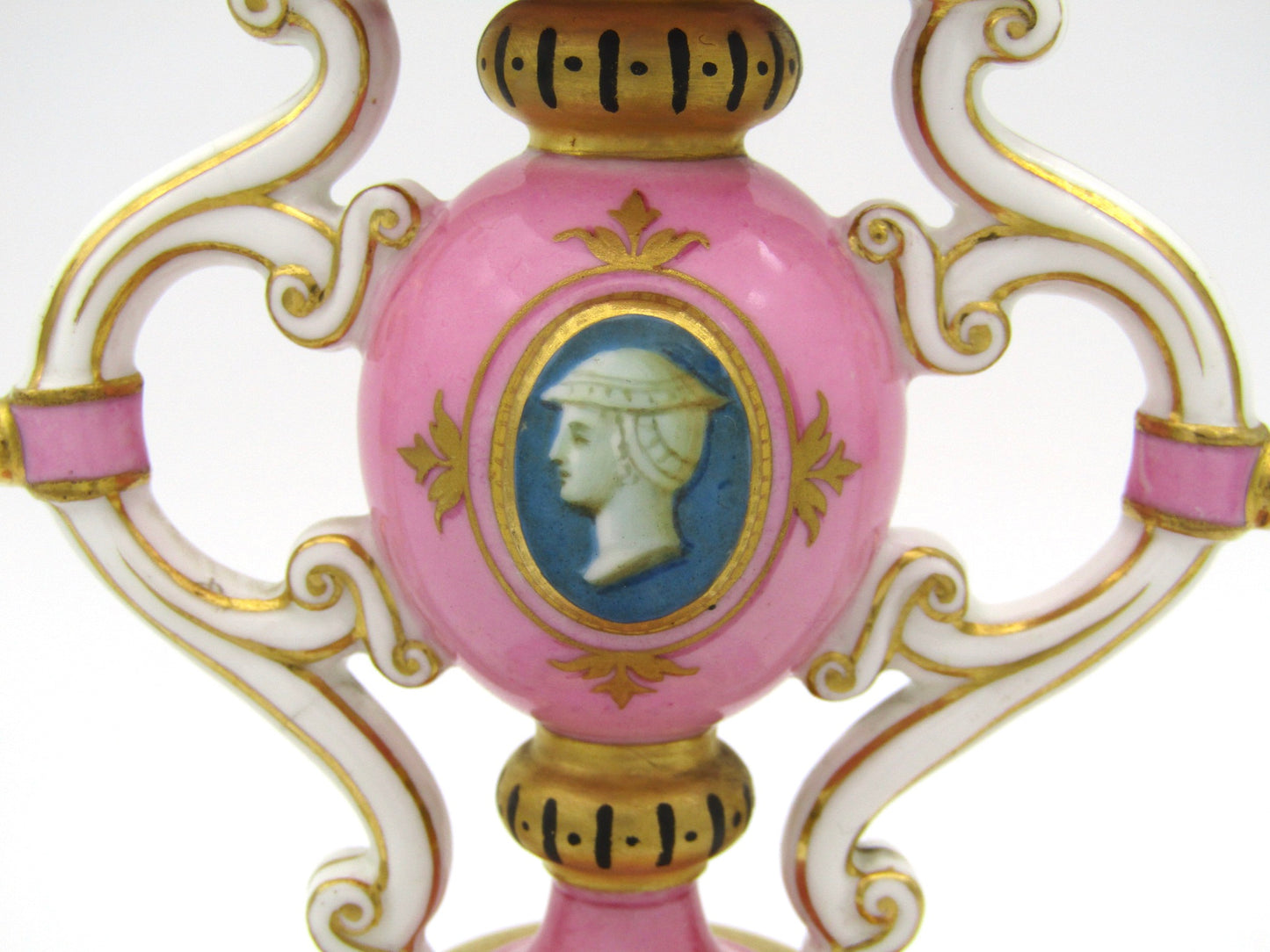 Minton pink and gilt candlestick, Circa 1870.