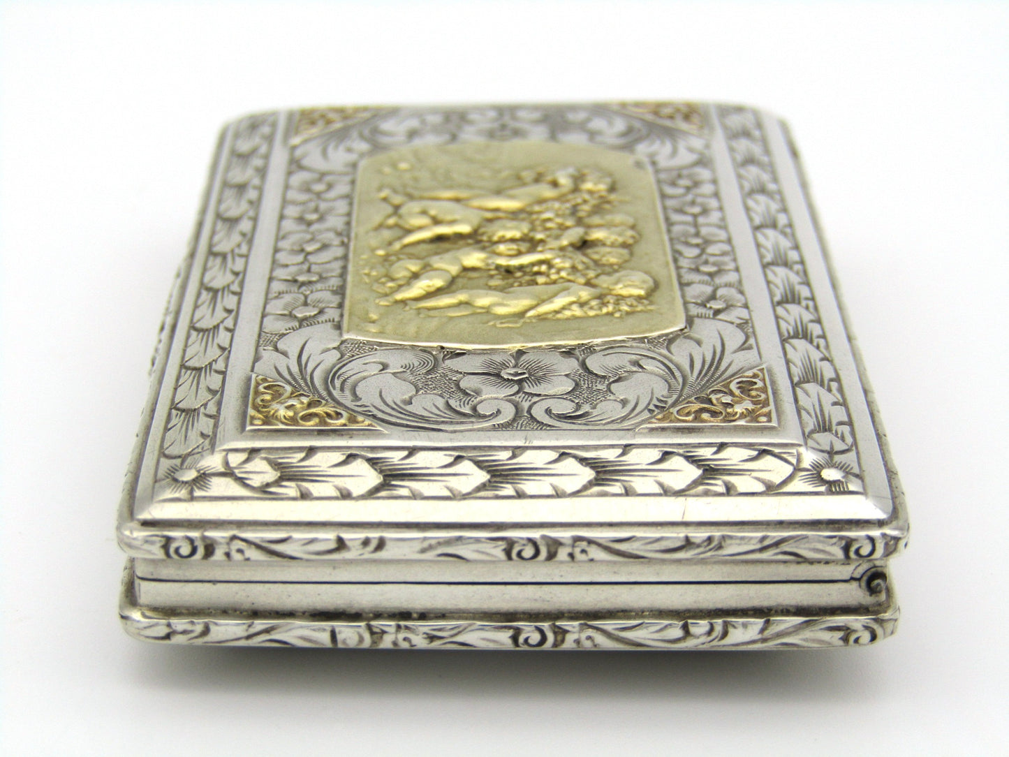 Italian silver parcel-gilt snuff box with gilded plaque, Circa 1850.