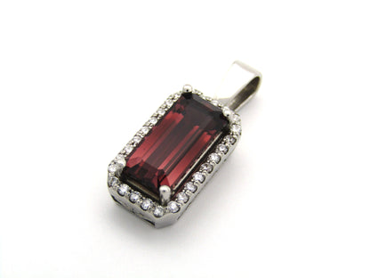 9K gold red tourmaline and diamond pendant.