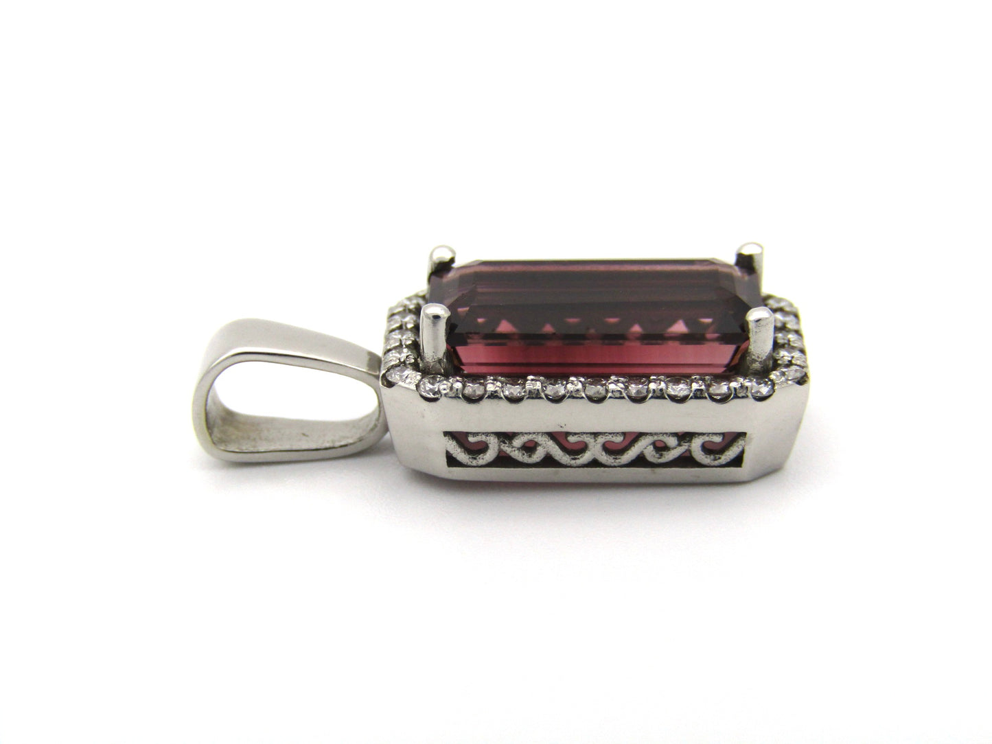 9K gold red tourmaline and diamond pendant.