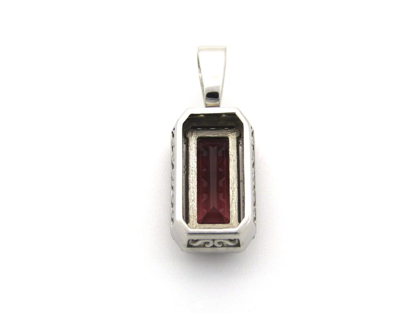 9K gold red tourmaline and diamond pendant.