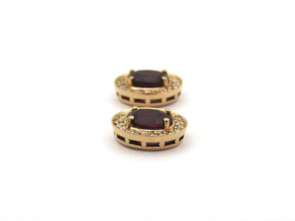 18K gold rhodolite garnet and diamond earrings.