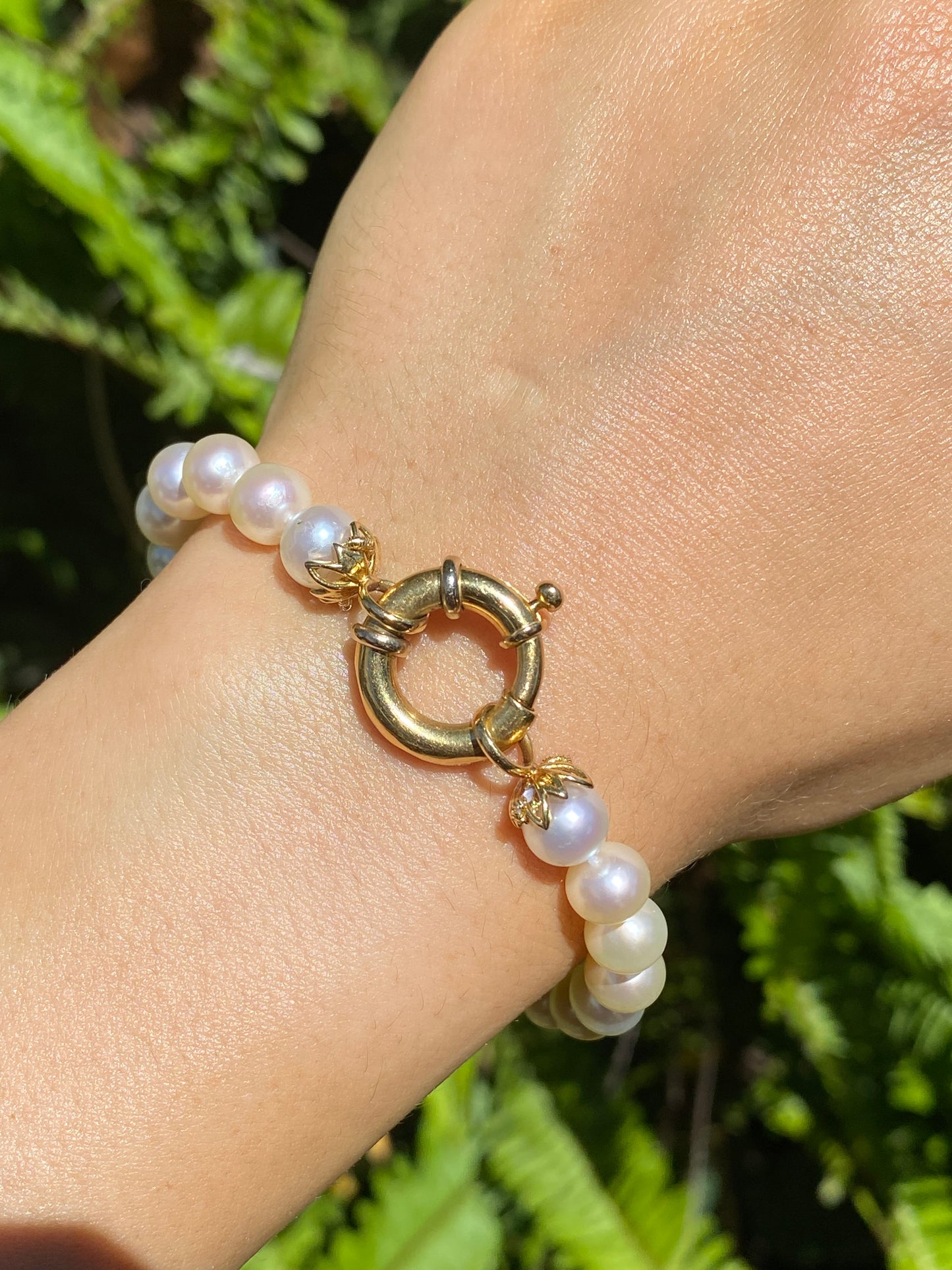 18K gold Protea pearl bracelet by Browns.