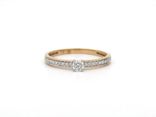 18K gold diamond ring.